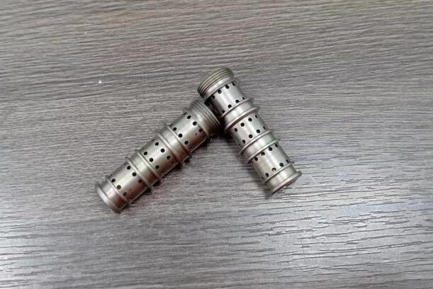看高速磨粒流是怎么批量化給液壓零件內孔去毛刺的？